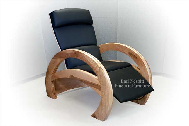 modern recliner chair in a slightly reclined position showing arched armrest from one side